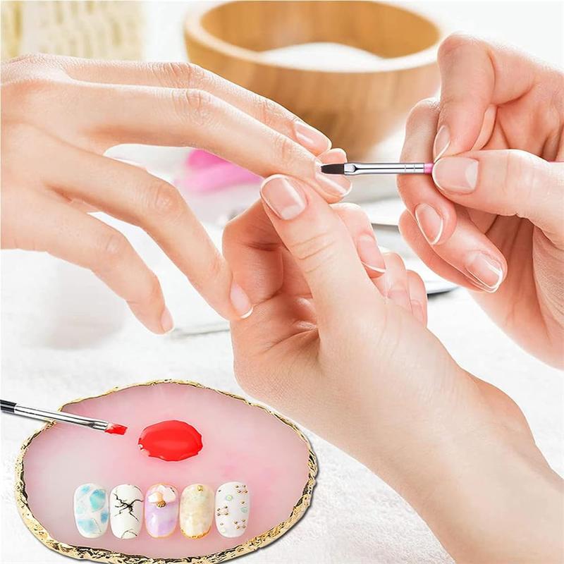 21-pcs pink nail art tool set with brushes, palette, carving pens etc., for home salon DIY nail art and makeup display.