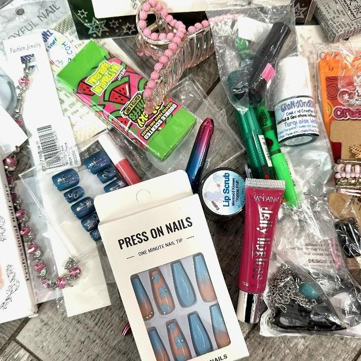 Flirt Scoop, Huge Scoop Of Fun Stuff, Totally Random, Make Up, Jewelry, Body Tattoos, Press On Nails, Nail Decals, Lip Gloss, Lip Scrubs, Hair Clips, Crystal Barrettes, Beaded Pens, Scented Erasers, Etc. Makeup Blush Contour  Cosmetic