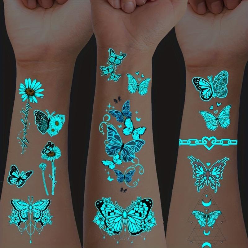 15 Sheets Glow-in-the-Dark Blue Luminous Butterfly Tattoo Stickers - Waterproof Temporary Tattoos with Feather, Deer, and Flower Patterns - Lasting 2-5 Days, Perfect for Shoulder, Finger, Wrist, Body, Clavicle, Arm, and Ankle Art for Women and Girls